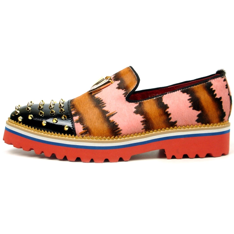 The FI-7455 Pink Slip on Fiesso by Aurelio Garcia showcases a vibrant design with a thick red sole, blending black, brown, and pink patterns. It is adorned with striking gold spikes and features a distinctive gold triangular embellishment.