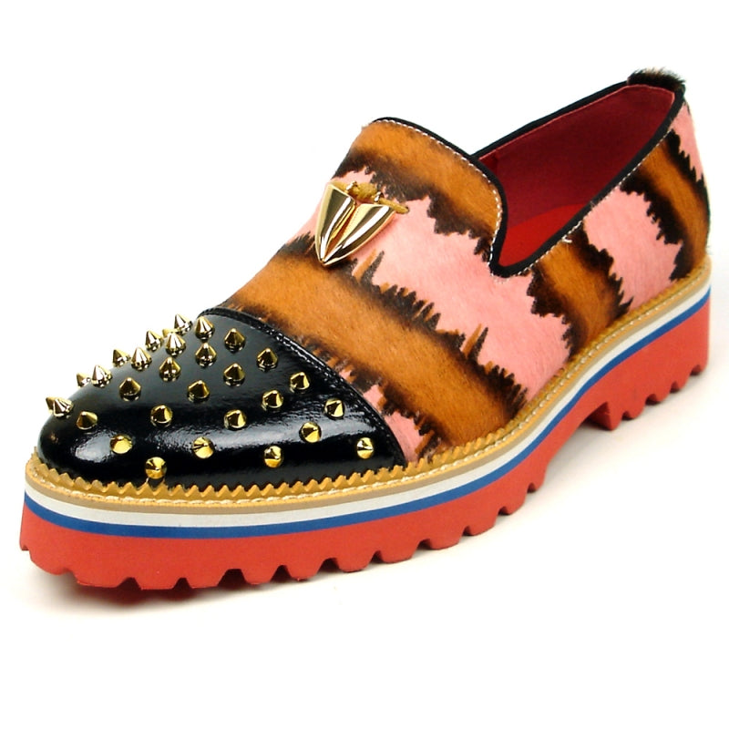 The FI-7455 Pink Slip on Fiesso by Aurelio Garcia showcases a vibrant design with a thick red sole, blending black, brown, and pink patterns. It is adorned with striking gold spikes and features a distinctive gold triangular embellishment.