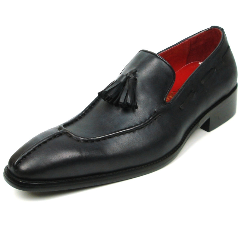 The FI-8701 Black Encore by Fiesso is a sophisticated leather loafer featuring elegant tassels, a luxurious red interior, and a low heel, perfect for those who appreciate high fashion shoes with timeless sophistication.