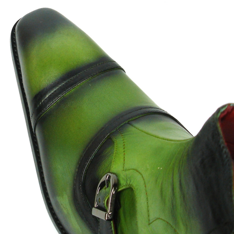 The FI-8709 Green Encore by Fiesso Boot boasts a green and black leather upper, accentuated with three decorative buckles and a pointed toe.