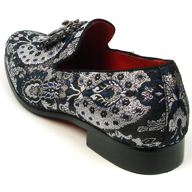 The FI-7385-3 Multi Color Slip-on by Fiesso features a stunning black and silver brocade design with a decorative gemstone embellishment on top and includes a cushioned insole for enhanced comfort.