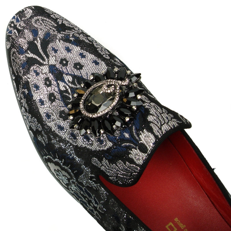 The FI-7385-3 Multi Color Slip-on by Fiesso features a stunning black and silver brocade design with a decorative gemstone embellishment on top and includes a cushioned insole for enhanced comfort.