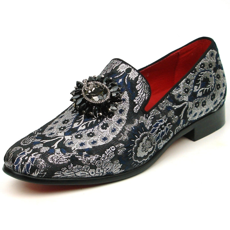 The FI-7385-3 Multi Color Slip-on by Fiesso features a stunning black and silver brocade design with a decorative gemstone embellishment on top and includes a cushioned insole for enhanced comfort.