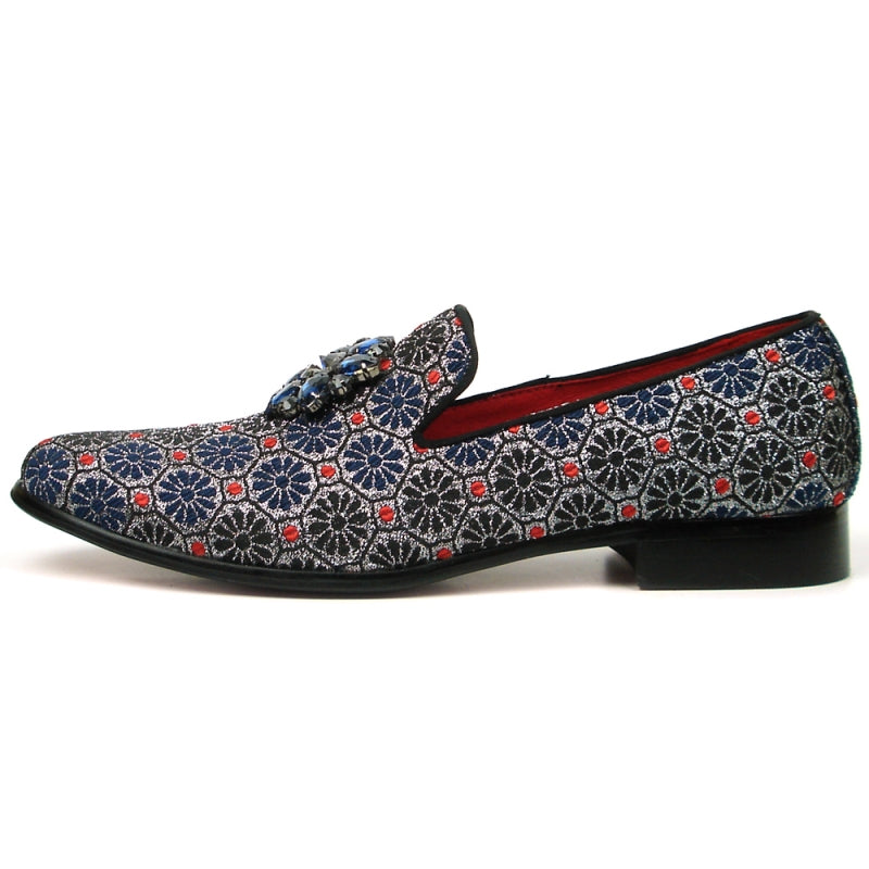 Introducing the FI-7385-4 Blue Multi Color Slip-on by Fiesso: a stylish decorative shoe embellished with a floral pattern and glittering blue and black gemstones on the upper, featuring a red interior lining and a cushioned insole for optimal comfort.