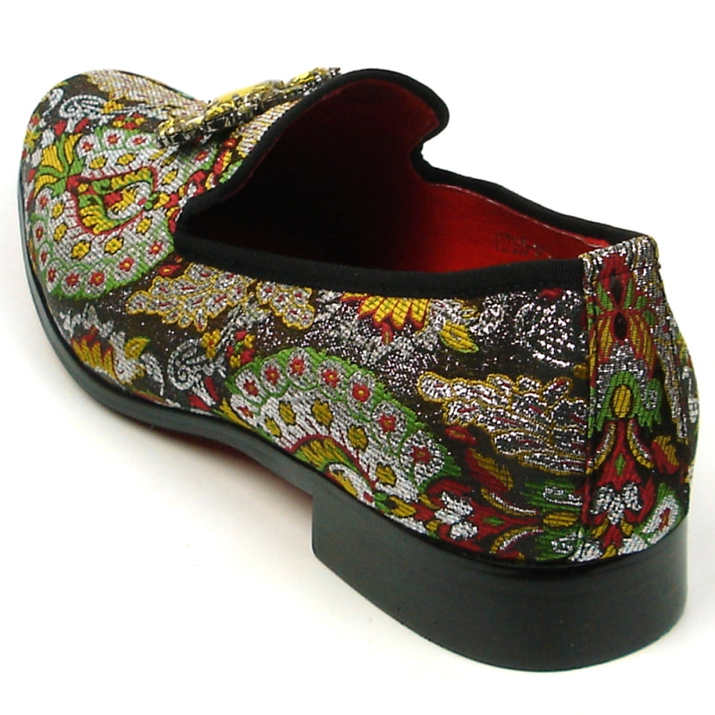 The FI-7385-5 Brown Multi Color Slip on by Fiesso features a vibrant design with an ornate gold embellishment on the front and a red interior, complete with a cushioned insole for enhanced comfort.