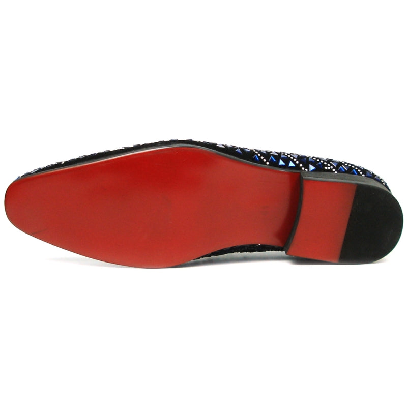 The FI-7415 Black Suede Blue Stone shoe by Fiesso boasts a black slip-on design adorned with a geometric pattern of blue and silver embellishments and is highlighted by a vibrant red interior lining.