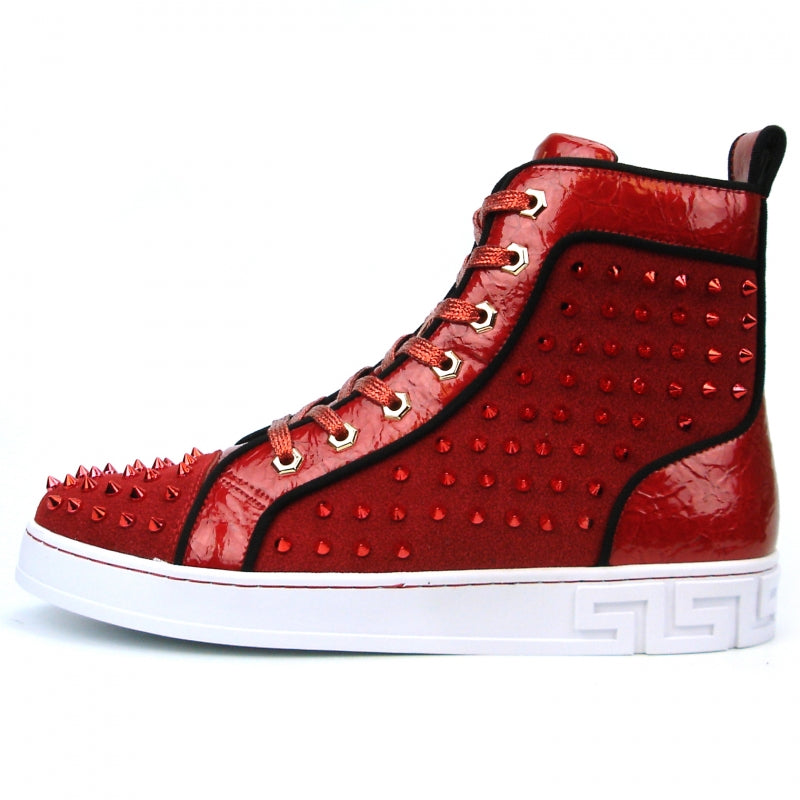 Introducing the FI-2364 Red High Top Sneaker Encore by Fiesso—this striking red high-top shoe features a glossy leather finish adorned with metal spikes on the toe and sides. Enhanced with red laces, a white sole, and decorative stitching, it seamlessly combines leather and suede for added sophistication.