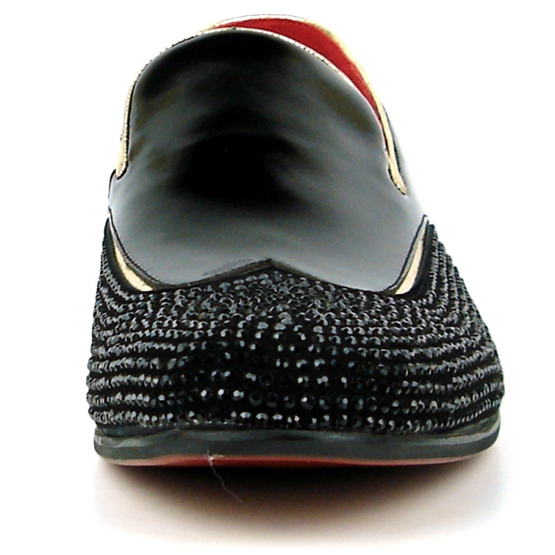 The FI-7483 Black Patent Wing Tip by Fiesso is a black fashion shoe with a patent leather upper and a red interior, featuring a glossy finish. It is elegantly adorned with small black beads and designed for comfort with its slip-on style and cushioned insole.