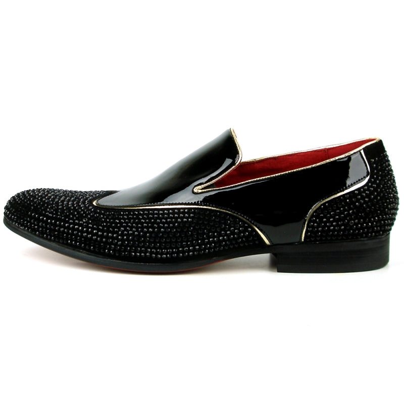 The FI-7483 Black Patent Wing Tip by Fiesso is a black fashion shoe with a patent leather upper and a red interior, featuring a glossy finish. It is elegantly adorned with small black beads and designed for comfort with its slip-on style and cushioned insole.