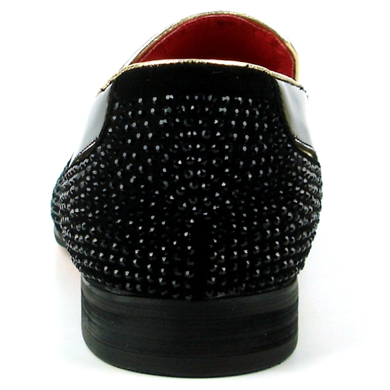 The FI-7483 Black Patent Wing Tip by Fiesso is a black fashion shoe with a patent leather upper and a red interior, featuring a glossy finish. It is elegantly adorned with small black beads and designed for comfort with its slip-on style and cushioned insole.