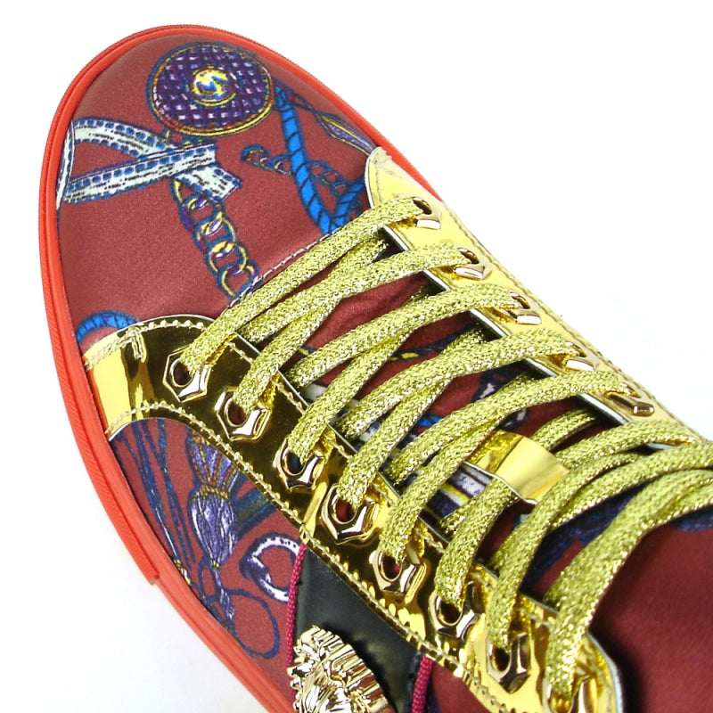 The FI-2385 Burgundy High Top Sneaker Encore by Fiesso features a vivid red hue complemented with exquisite gold accents and intricate designs, crafted from premium micro leather. Its side is adorned with an impressive gold lion emblem, adding a touch of majestic sophistication.