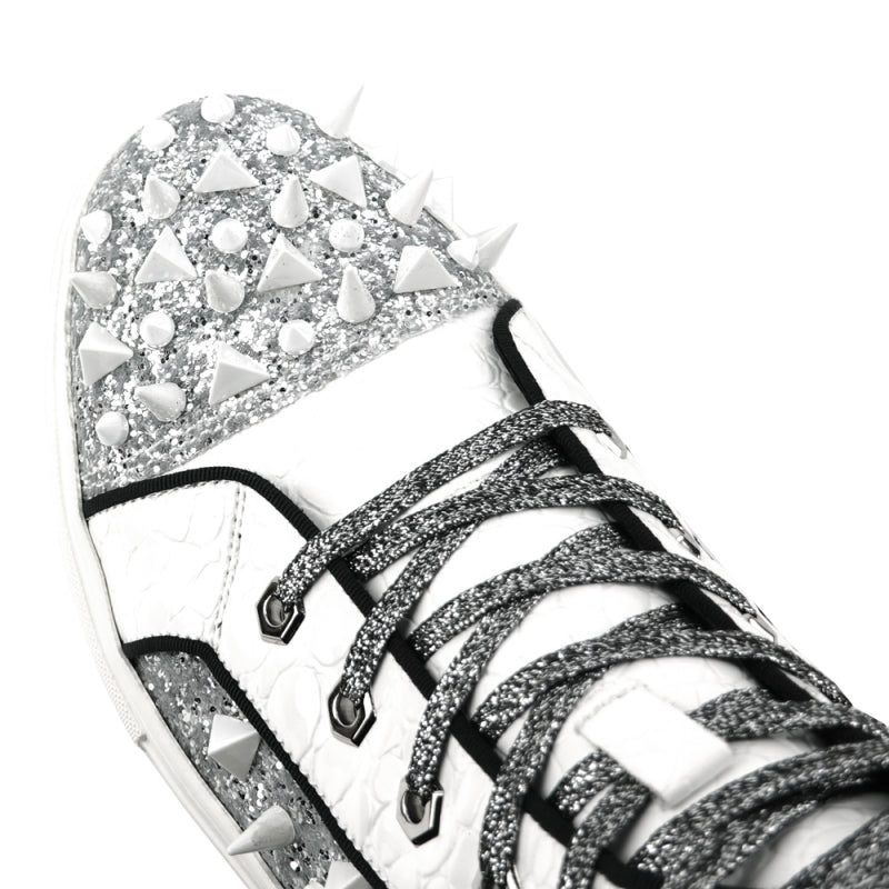 The FI-2369 White Spikes High Top Sneakers by Fiesso showcase a glittery upper embellished with metallic silver panels, complete with white laces and adorned with white spikes across the surface.