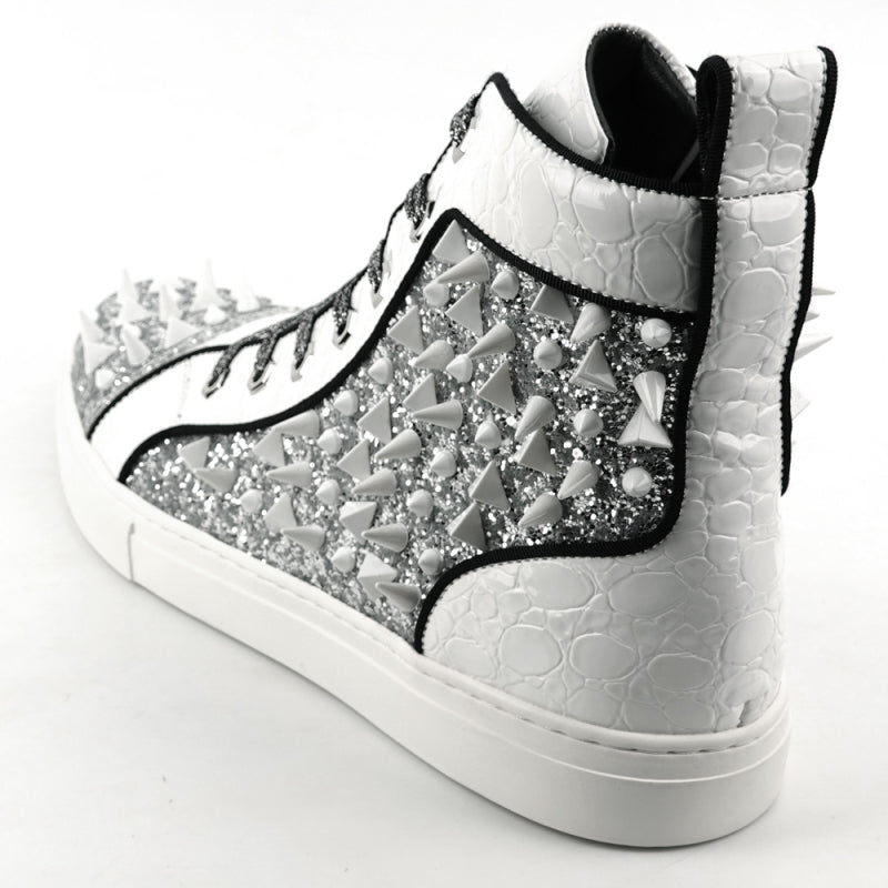 The FI-2369 White Spikes High Top Sneakers by Fiesso showcase a glittery upper embellished with metallic silver panels, complete with white laces and adorned with white spikes across the surface.