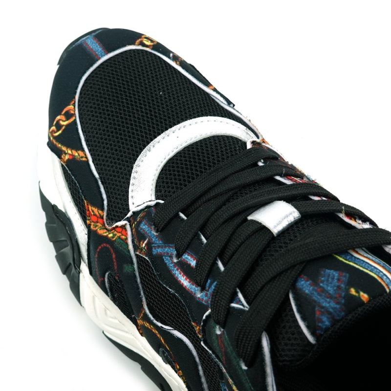 The FI-2404 Black Sneaker Encore by Fiesso is a casual shoe that combines fashion comfort with style. It features a colorful graphic pattern crafted from micro leather, complemented by a white and black sole and black laces. This standout sneaker by the brand Fiesso is perfect for those looking to make a statement.