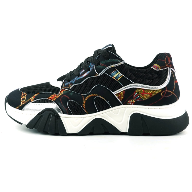 The FI-2404 Black Sneaker Encore by Fiesso is a casual shoe that combines fashion comfort with style. It features a colorful graphic pattern crafted from micro leather, complemented by a white and black sole and black laces. This standout sneaker by the brand Fiesso is perfect for those looking to make a statement.