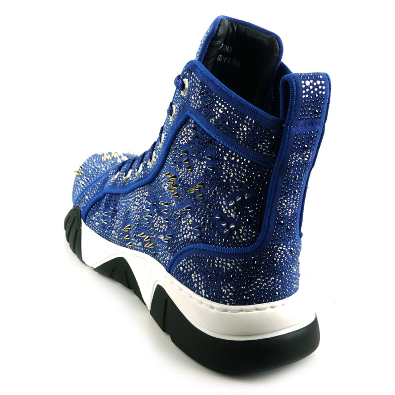 Introducing the FI-2412 Blue Suede Rhinestones Spikes Encore by Fiesso: a stylish blue high-top sneaker with a suede upper embellished with rhinestones and metallic spikes, set on a chunky white and black sole.