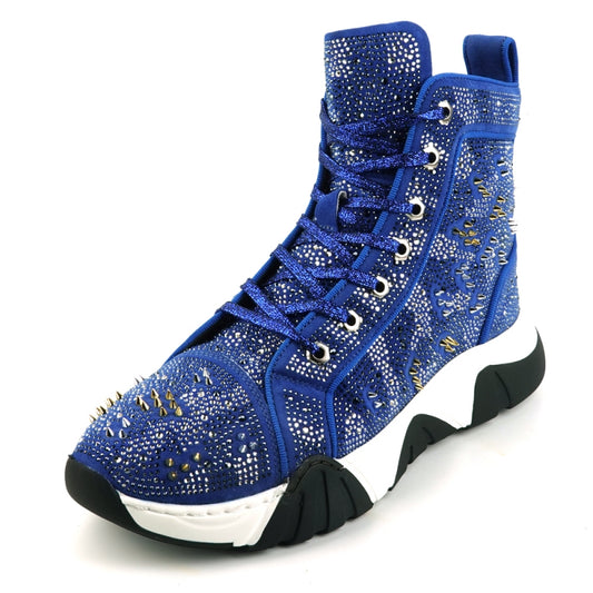 Introducing the FI-2412 Blue Suede Rhinestones Spikes Encore by Fiesso: a stylish blue high-top sneaker with a suede upper embellished with rhinestones and metallic spikes, set on a chunky white and black sole.