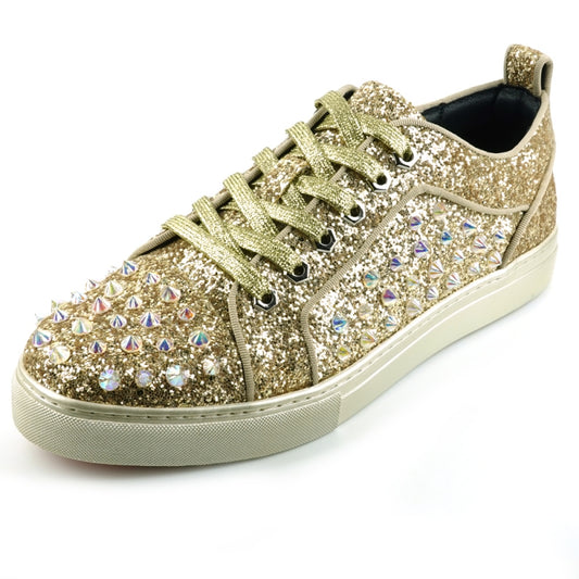 The FI-2414 Gold Glitter Spike Low Cut Sneaker Encore by Fiesso boasts a gold glitter upper adorned with multicolored rhinestones and gold laces, along with a cushioned insole to enhance comfort.