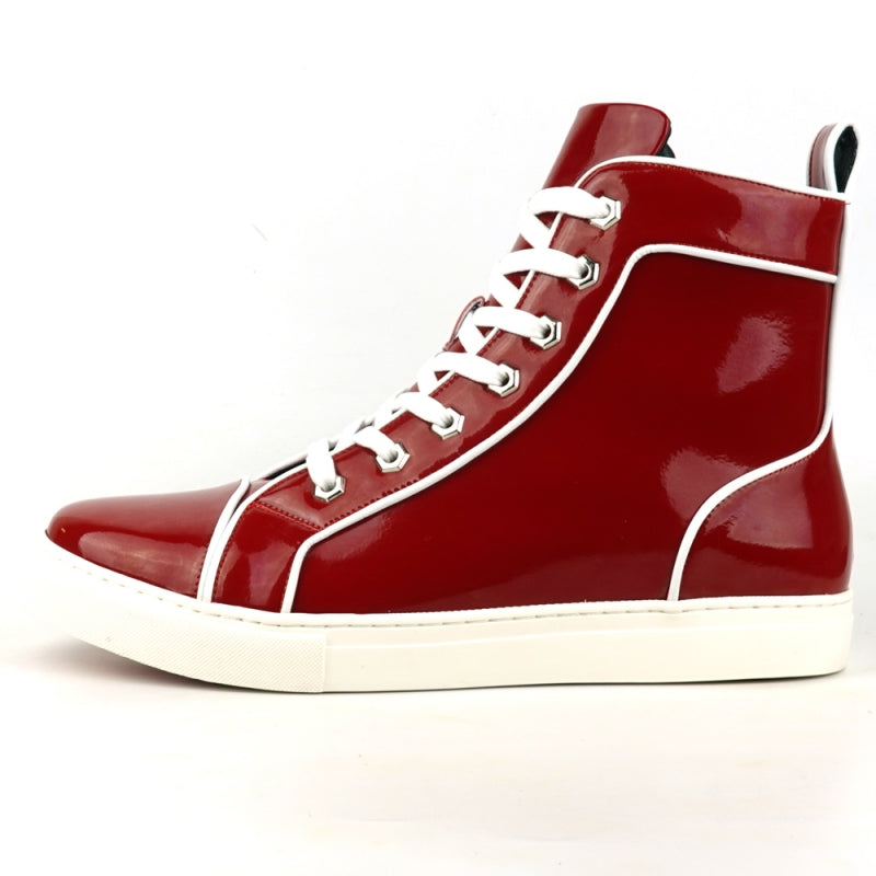 The FI-2416 Red Patent Leather High Top Sneaker by Fiesso is a striking piece with a glossy finish, adorned with white laces and trim, and featuring a white sole. It stands out against a plain background for an elegant and stylish look.