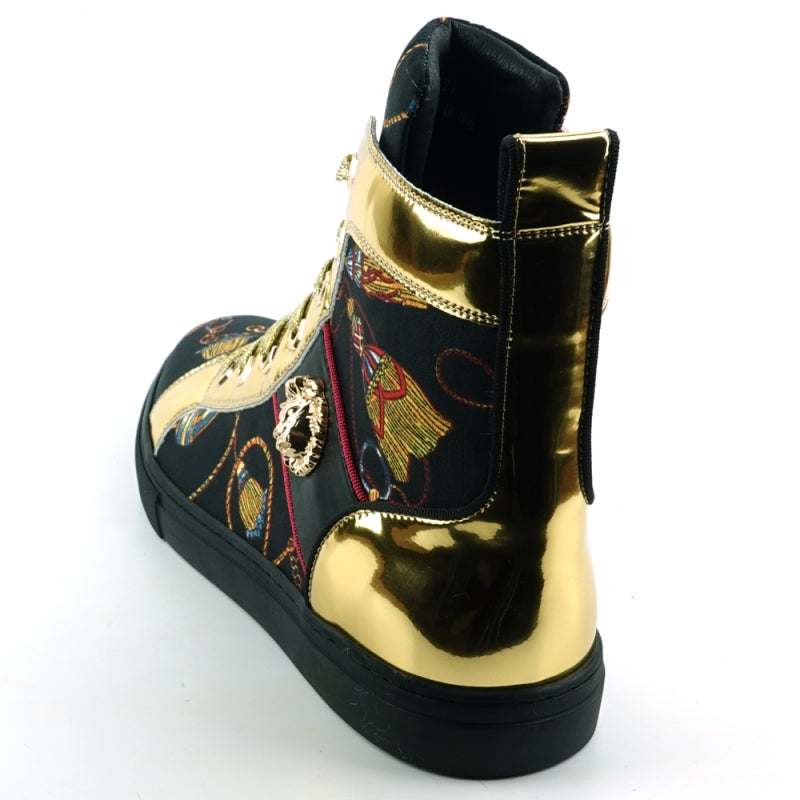 The FI-2421 Black High Top Sneaker Encore by Fiesso, designed by Fiesso, features a combination of micro leather and black fabric, enhanced with gold metallic accents, patterned laces, and a decorative gold lion emblem on the side.