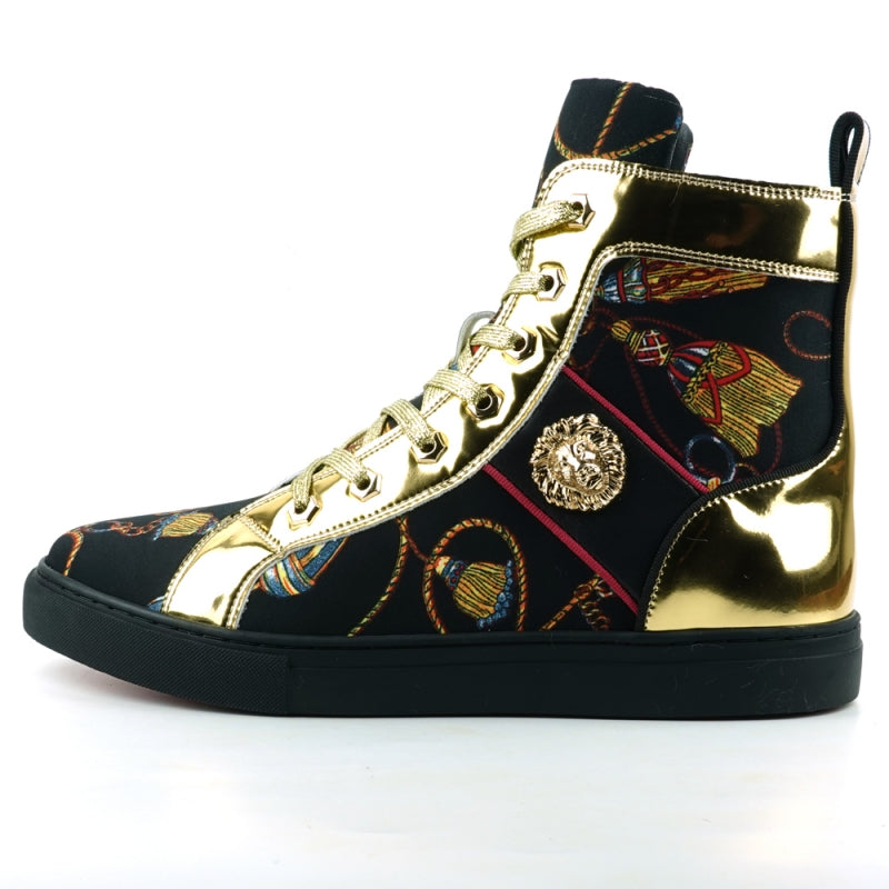 The FI-2421 Black High Top Sneaker Encore by Fiesso, designed by Fiesso, features a combination of micro leather and black fabric, enhanced with gold metallic accents, patterned laces, and a decorative gold lion emblem on the side.