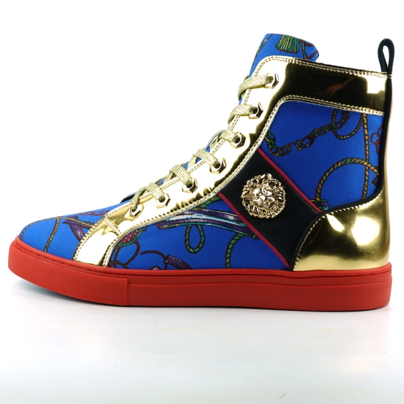 The FI-2421 Blue High Top Sneaker Encore by Fiesso features a striking blue and gold pattern, a distinctive red sole, multicolored laces, and is adorned with a Gold Lion emblem on the side.