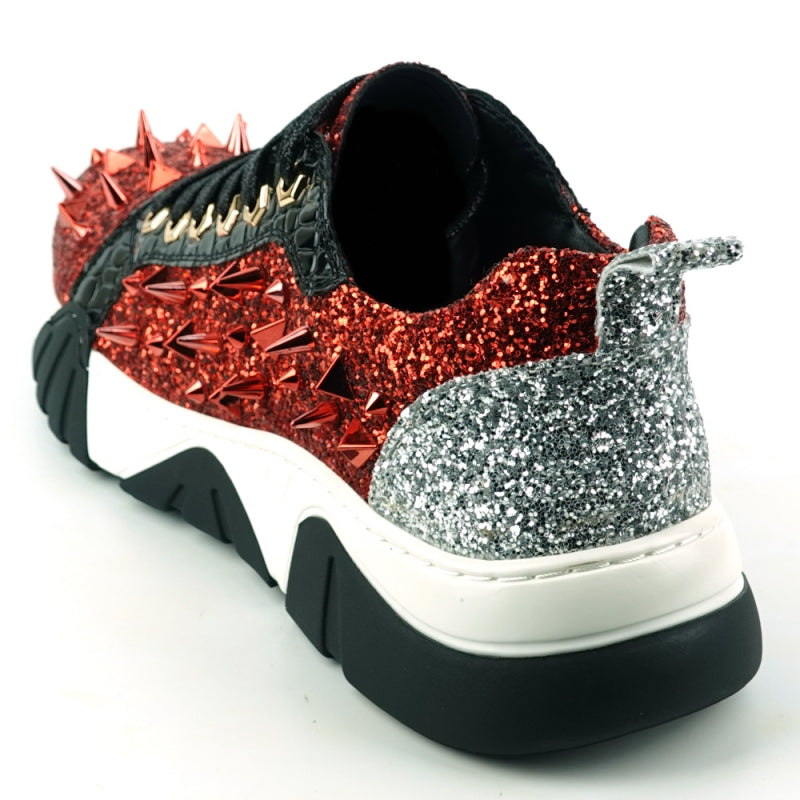 The FI-2406 Red Black Encore by Fiesso from the brand Fiesso captivates with its red glitter upper adorned with black accents and laces, alongside a striking silver heel and metallic red spikes, all supported by a stylish white and black sole.