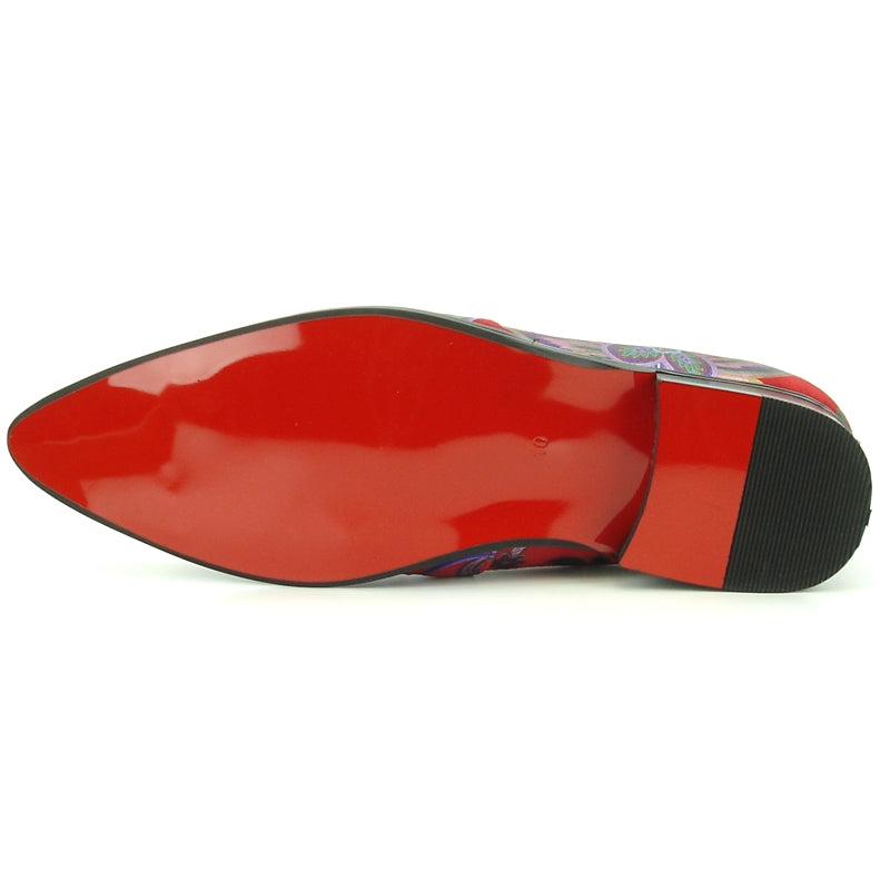 Introducing the FI-7133 Red Floral Metal Tip by Fiesso, a stylish shoe from the Fiesso brand. This fashion statement features a red leather upper decorated with striking blue and purple floral patterns and is accented with a metallic gold pointed toe. The shoe also includes a cushioned insole for enhanced comfort.