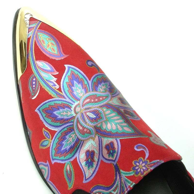 Introducing the FI-7133 Red Floral Metal Tip by Fiesso, a stylish shoe from the Fiesso brand. This fashion statement features a red leather upper decorated with striking blue and purple floral patterns and is accented with a metallic gold pointed toe. The shoe also includes a cushioned insole for enhanced comfort.