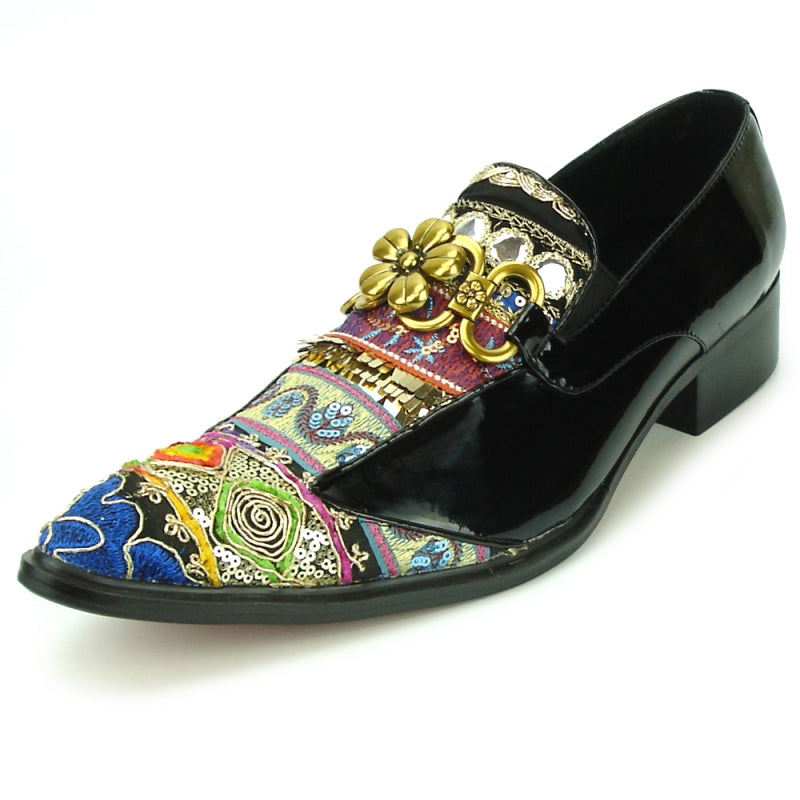 The FI-7237 Black-Multicolor Slip On by Fiesso offers a stylish design with a leather upper and low heel, featuring intricate patterns and decorative gold flowers. It provides ultimate comfort with its cushioned insole.