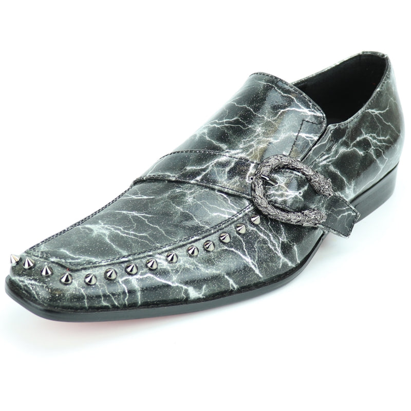 Introducing the FI-7248 Grey Slip On by Fiesso from Aurelio Garcia, a fashionable shoe featuring a chic leather upper. This slip-on showcases a marbled design embellished with metallic studs and a decorative buckle, ensuring all-day comfort with its cushioned insole.