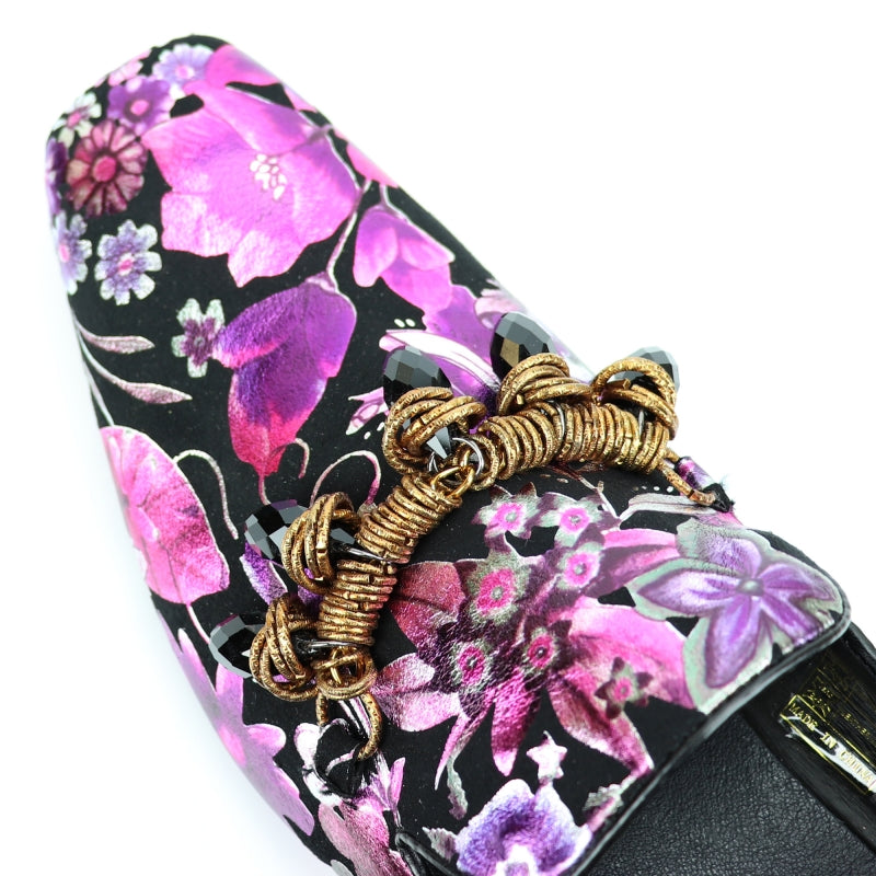 The FI-7255 Multicolor Slip On by Fiesso showcases a floral-patterned design in pink, purple, and black, adorned with decorative tassels and sparkling gemstones for the perfect fashion shoe.