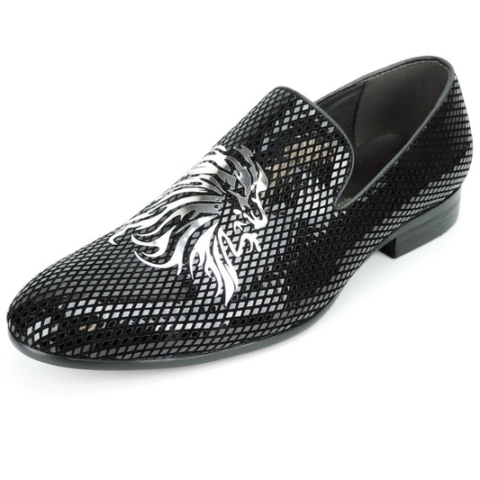 The FI-7270 Black Silver Slip On by Fiesso—crafted with a leather upper—showcases a striking grid pattern and a silver lion's head design on the front, complemented by a cushioned insole for added comfort.