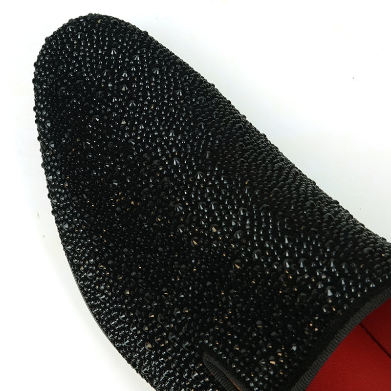 Fiesso presents the FI-7525 Black Suede Slip-On Loafer with dazzling black rhinestones, featuring a red interior and low heel for a fashionable accent.