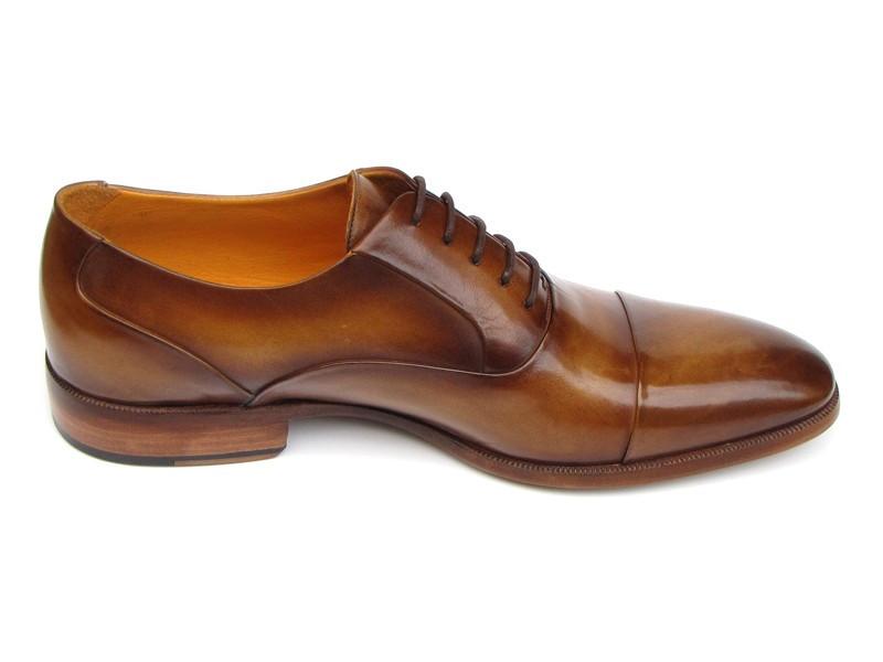 Introducing the Paul Parkman Captoe Oxfords in Brown Leather, model 074-CML—a pair of exquisitely handmade men's dress shoes in a classic oxford captoe style, displayed from both top and side angles. Crafted by renowned brand Paul Parkman, these shoes boast elegant brown leather finishes and tasteful laces.