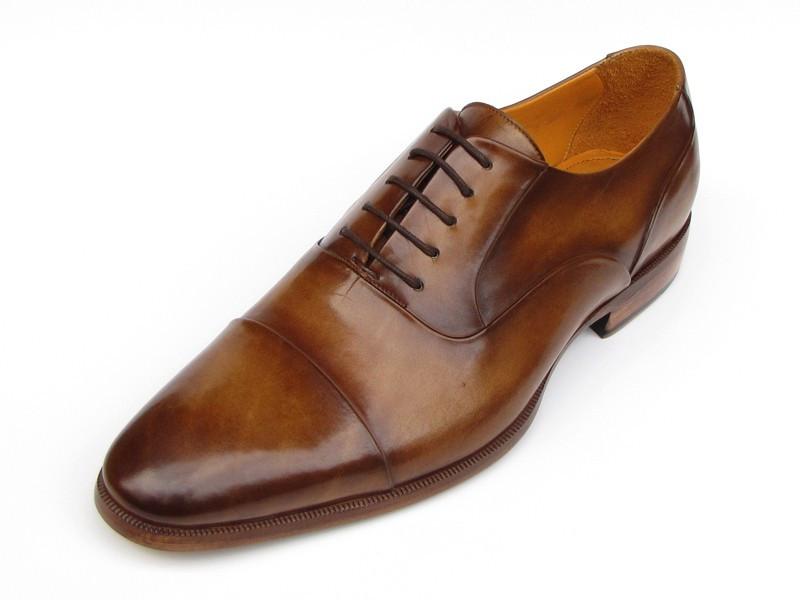 Introducing the Paul Parkman Captoe Oxfords in Brown Leather, model 074-CML—a pair of exquisitely handmade men's dress shoes in a classic oxford captoe style, displayed from both top and side angles. Crafted by renowned brand Paul Parkman, these shoes boast elegant brown leather finishes and tasteful laces.