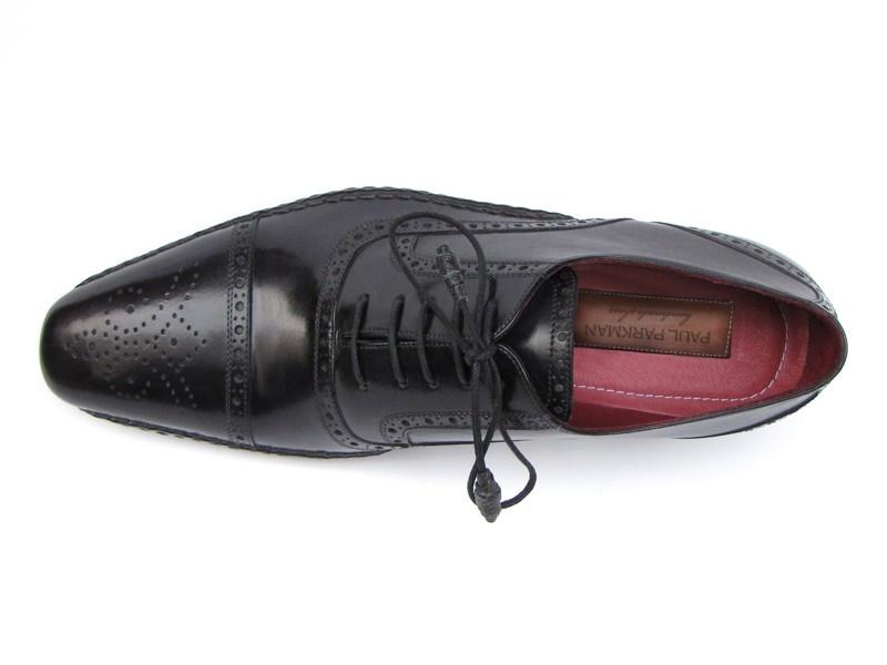 A pair of Paul Parkman Captoe Oxfords Black Shoes - 5032-BLK, featuring a handmade design in black leather with intricate detailing and a striking red inner lining, displayed side by side.