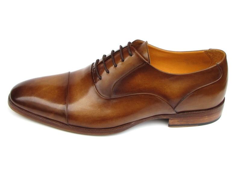 Introducing the Paul Parkman Captoe Oxfords in Brown Leather, model 074-CML—a pair of exquisitely handmade men's dress shoes in a classic oxford captoe style, displayed from both top and side angles. Crafted by renowned brand Paul Parkman, these shoes boast elegant brown leather finishes and tasteful laces.