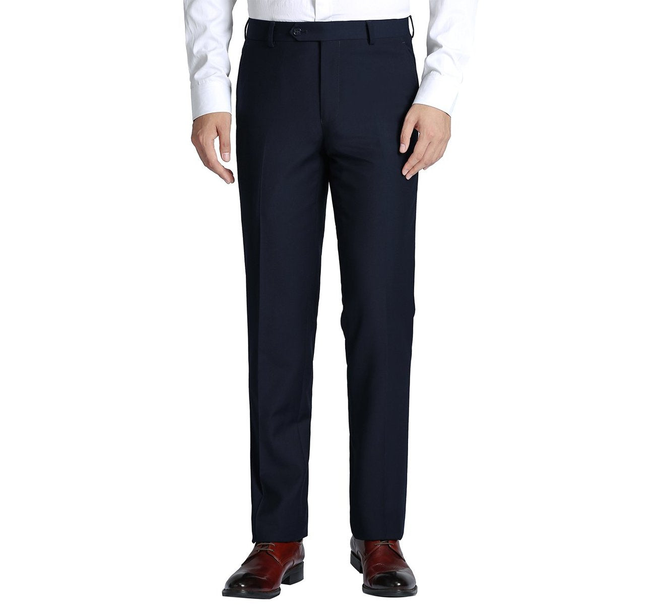 A person wearing a white shirt, Renoir's Alessandro Vitello dark navy classic fit flat front suit separate pants, and brown shoes stands on a plain white background.