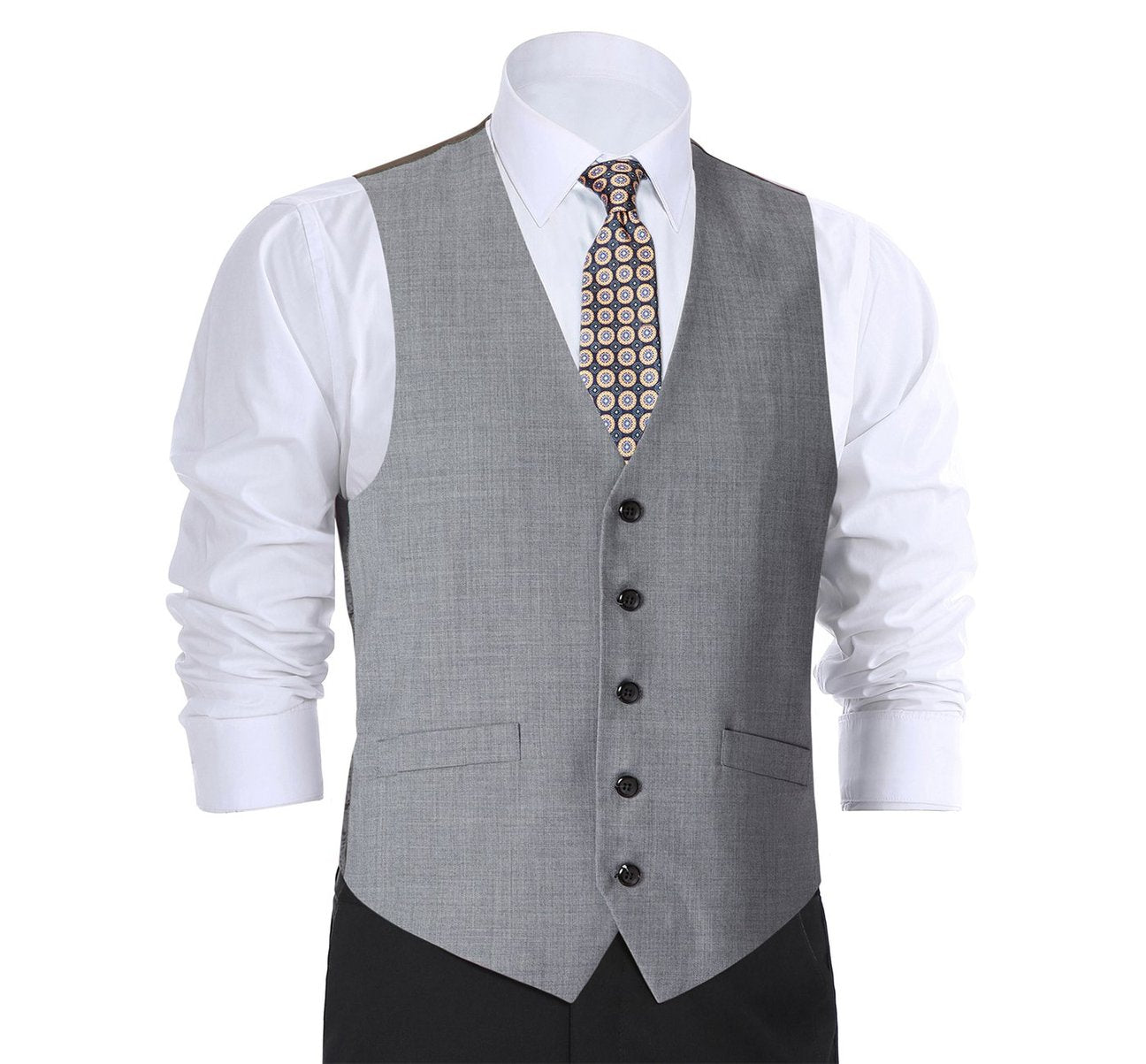 A man wearing the Alessandro Vitello by Renoir Light Grey Wool Suit Vest, a regular fit dress waistcoat over a striped shirt, paired with a patterned tie and hands in pockets.