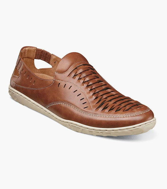 The Stacy Adams - IBIZA Woven Vamp Moc Toe Slip On in Sienna features a woven vamp moc toe, ventilated sides, a cushioned footbed for extra comfort, and a lightweight beige rubber sole.