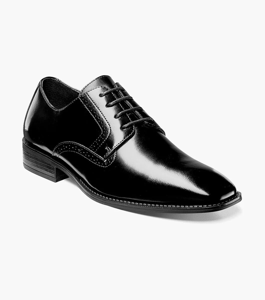 The Stacy Adams ARDELL Plain Toe Oxford in black, featuring a slip-resistant sole and classic laces, is elegantly displayed on a pristine white background.