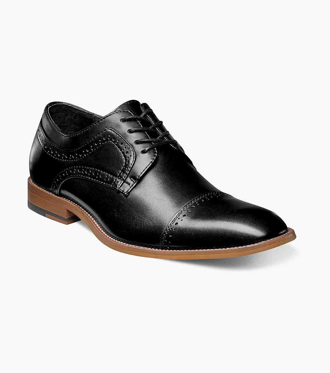 The Stacy Adams DICKINSON Cap Toe Oxford in black features decorative stitching, a brown sole, and a comfortable memory foam insole.