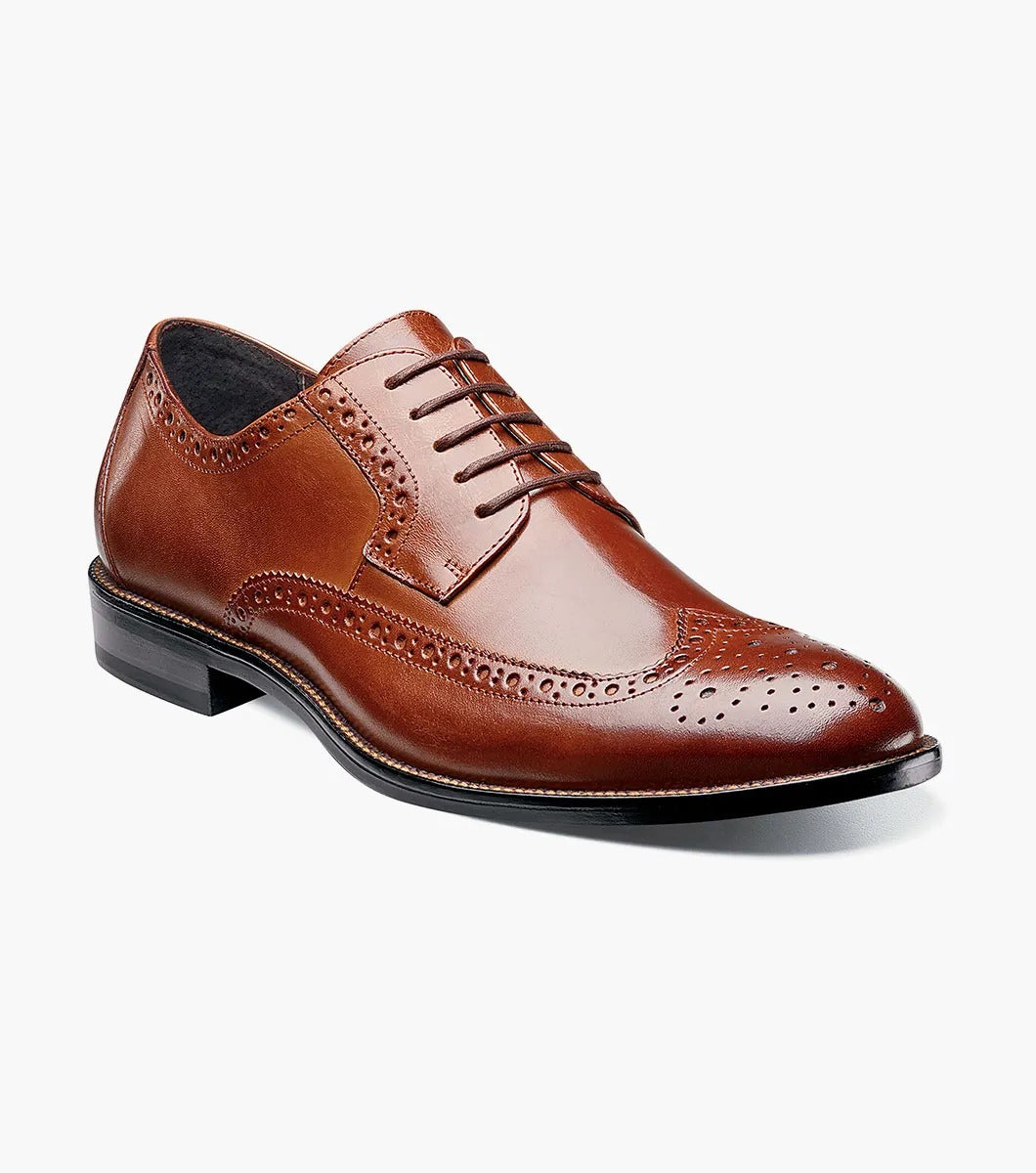 Stacy Adams GARRISON Wingtip Oxford in Cognac, featuring genuine leather with decorative perforations, a black sole, and a cushioned insole for enhanced comfort.