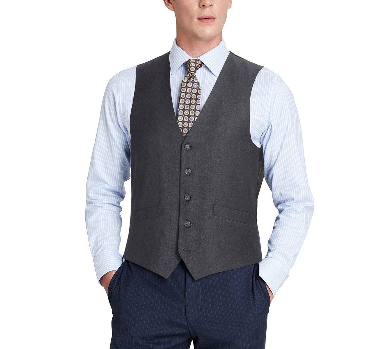 A person wearing the Alessandro Vitello by Renoir Charcoal Button Formal Suit Vest Regular Fit Waistcoat over a blue striped shirt with a patterned tie, hands in pockets, exudes a classic fit in formal wear.