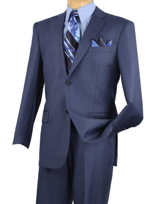 A mannequin is elegantly styled in the Vinci Regular Fit 2 Piece 2 Button Textured Weave Suit (Blue) by Vinci Suits, complete with a matching tie and pocket square over a light blue shirt, featuring regular fit flat front pants that enhance its sophistication.