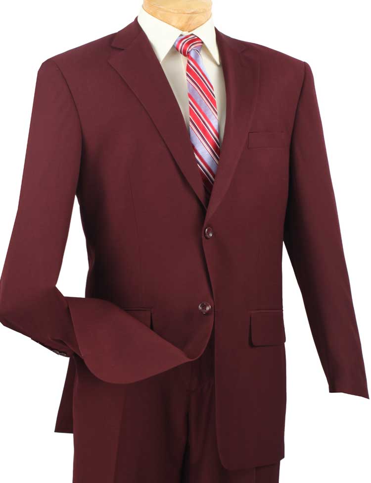 Displayed on the mannequin is the Vinci Regular Fit 2 Piece 2 Button Textured Weave Suit in burgundy, from Vinci Suits, featuring flat front pants. It's styled with a white shirt and a red, white, and blue striped tie.