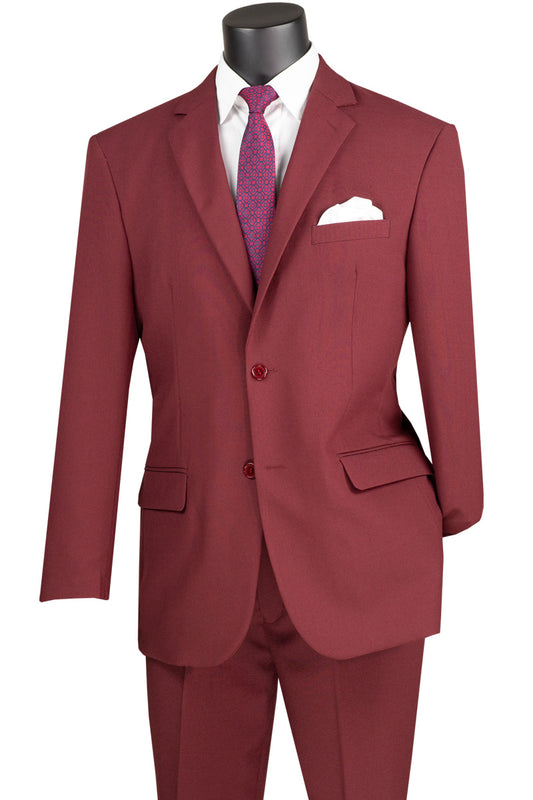 Displayed on the mannequin is the Vinci Single Breasted Poplin Dacron Suit in Burgundy from Vinci Suits, featuring flat front pants and a sleek two-button, single-breasted design, elegantly paired with a white shirt, purple tie, and white pocket square.