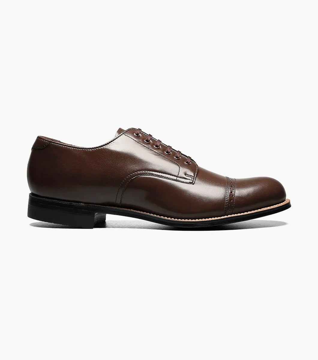 Stacy Adams - MADISON Cap Toe Oxford in luxurious brown kidskin leather, with sleek black laces, gracefully showcased on a white background.