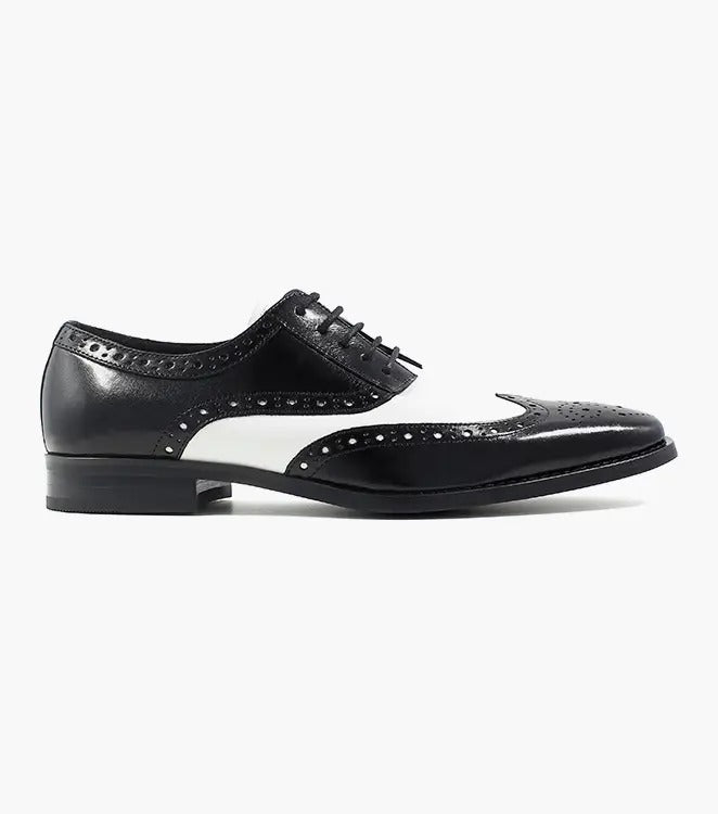 The Stacy Adams TINSLEY Wingtip Oxford in black with white, product number 25092-111, is a stylish shoe crafted from buffalo leather featuring decorative perforations and black laces.